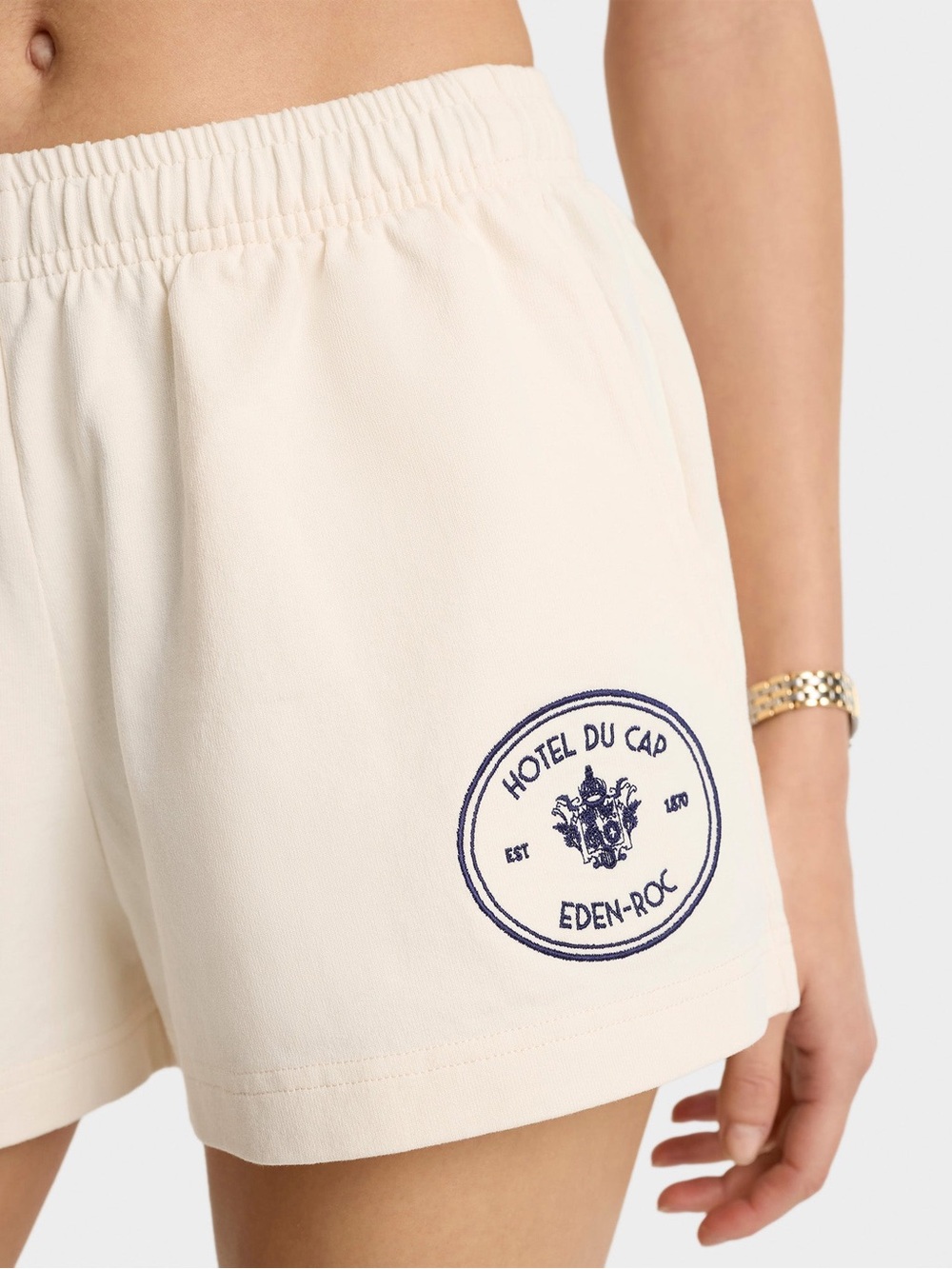 SPORTY & RICH X HOTEL EDEN ROC Eden Crest Disco Short Cream/Navy {$120} LARGE